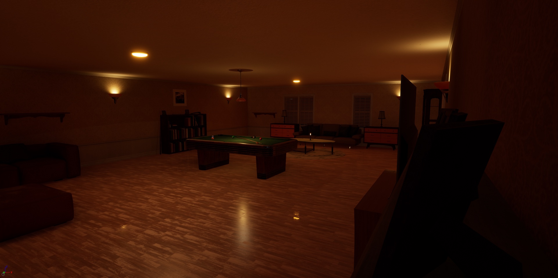 The game room: a pool table and seating under recessed ceiling lights.